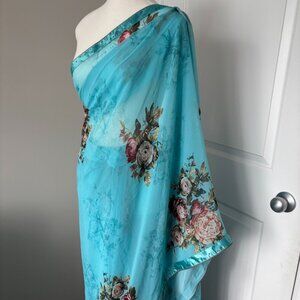 Beautiful brand new blue floral saree satin border